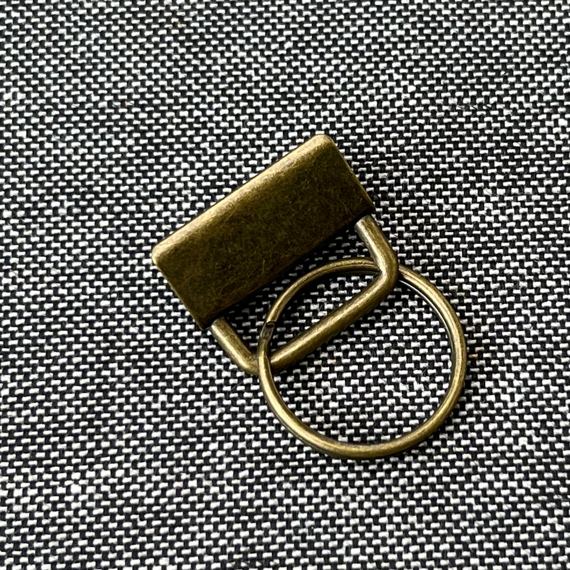Puntero llavero de metal bronce