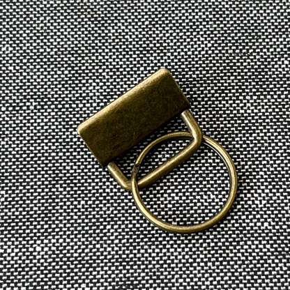 Puntero llavero de metal bronce